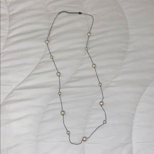 Long pearl necklace